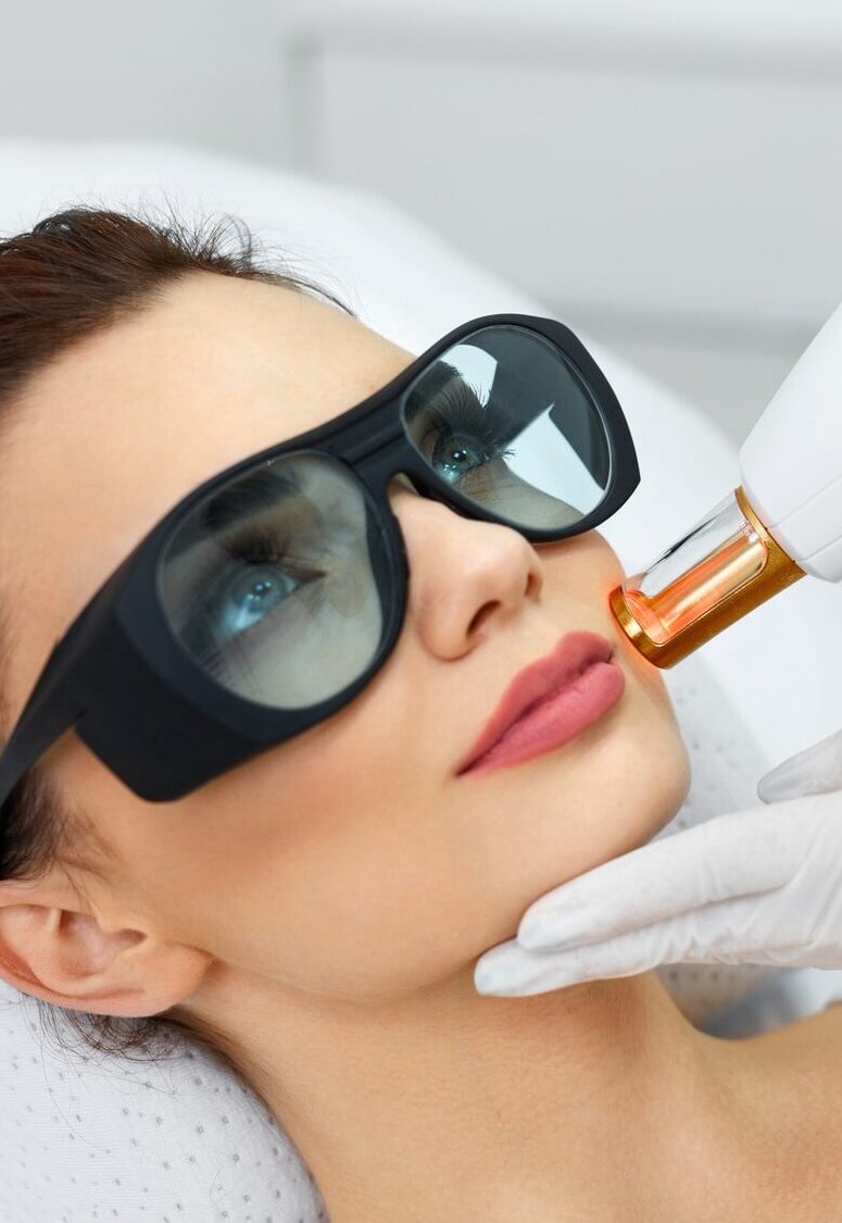 Cosmetology. Closeup Of Beautiful Young Woman Receiving Rejuvenation Treatment In Spa Salon. Medical Worker Doing Skin Resurfacing And Dermabrasion For Female Client. Skin Procedures. High Resolution