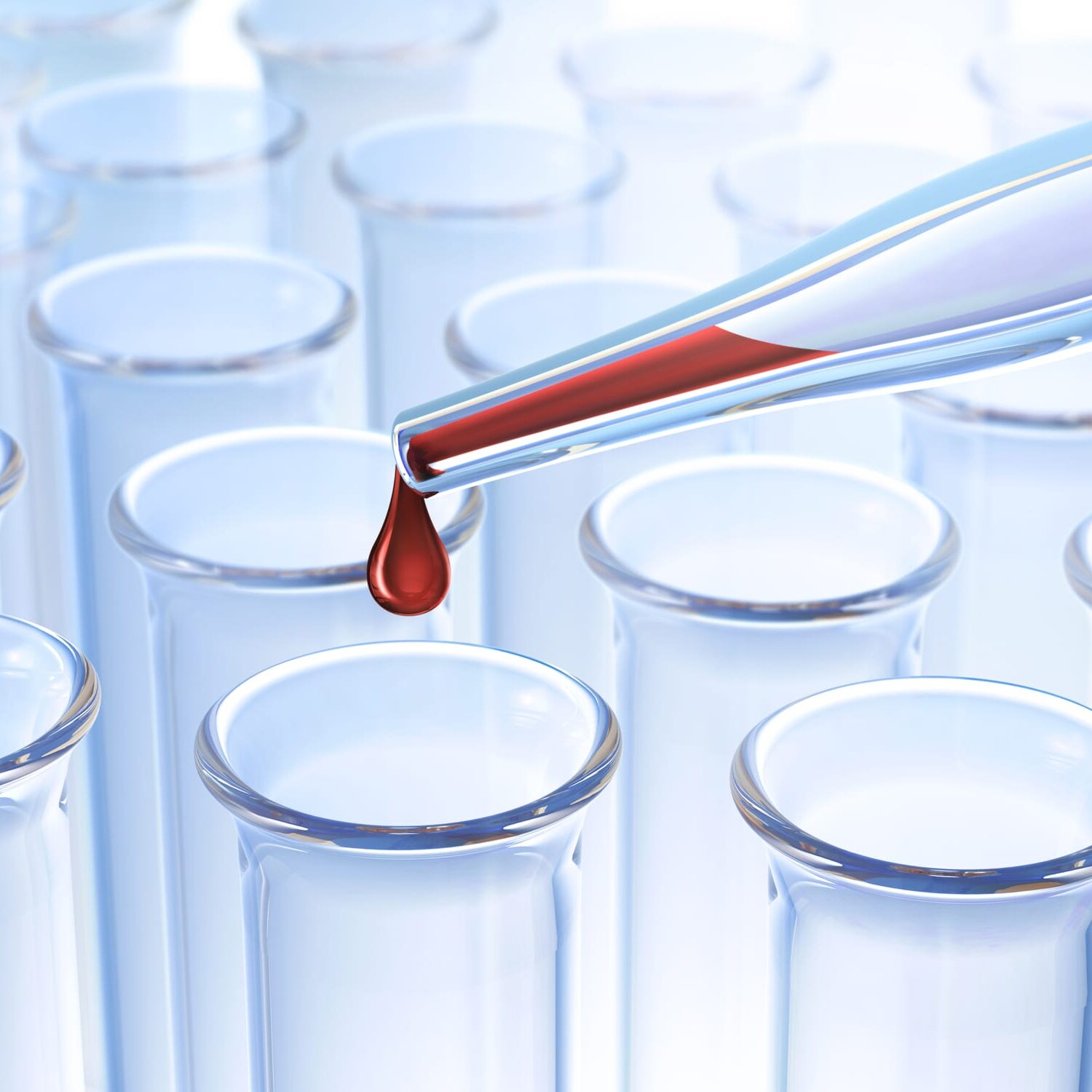 Filling a test tube with red liquid.