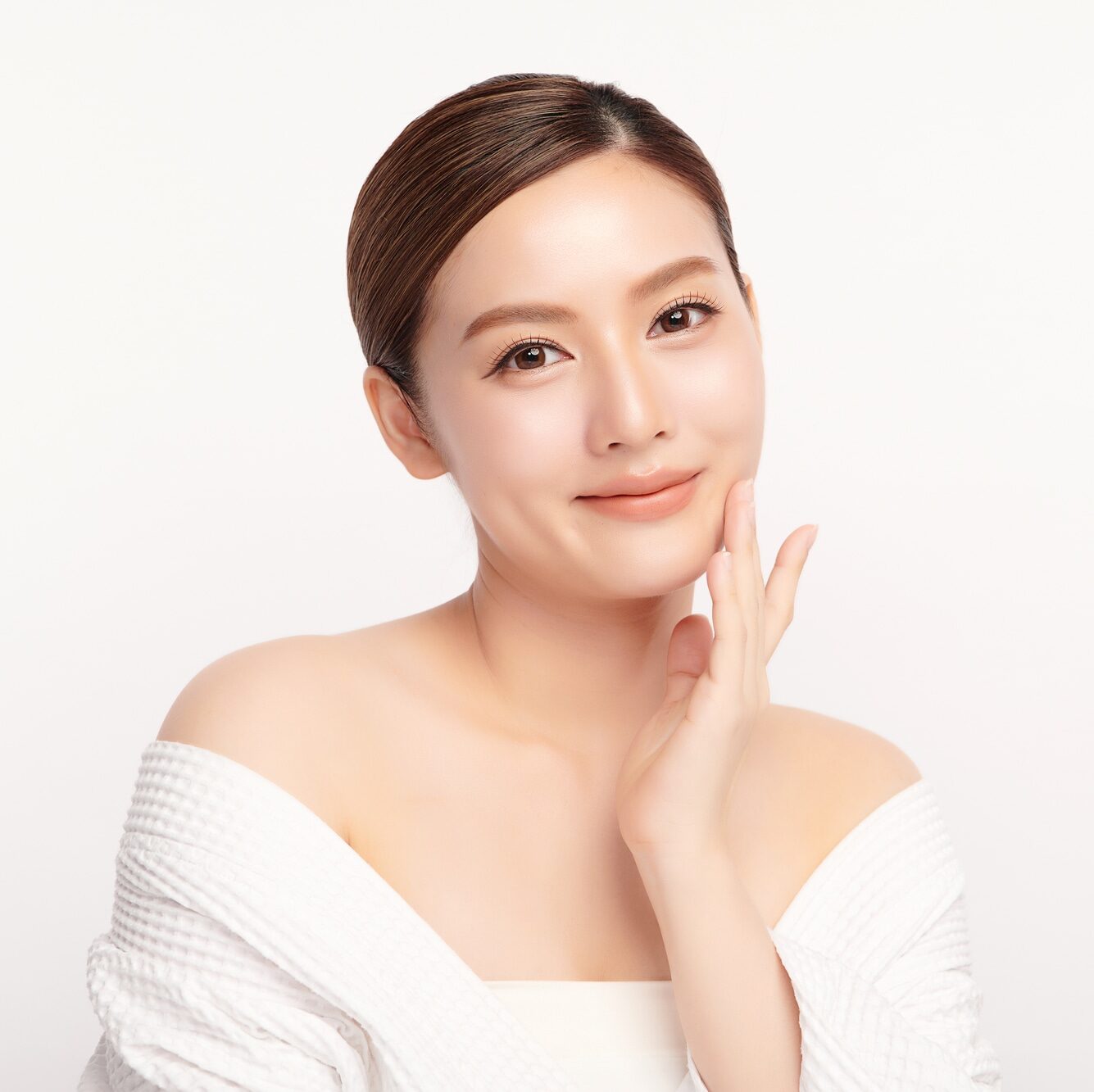 Beautiful young asian woman with clean fresh skin on white background, Face care, Facial treatment, Cosmetology, beauty and spa, Asian women portrait.